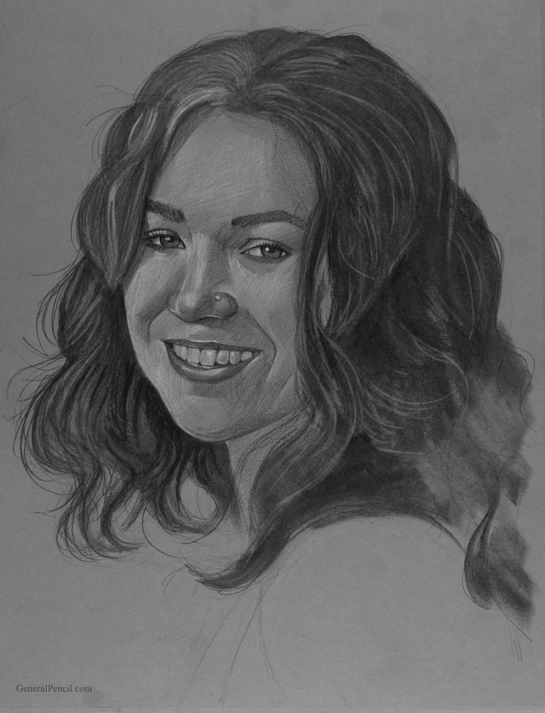 Black and white sketch of a smiling person with wavy, shoulder-length hair looking slightly to the side. The drawing showcases detailed shading and texture, highlighting the person's facial features and expression.